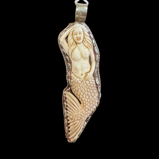 Bonecarved mermaid pendant