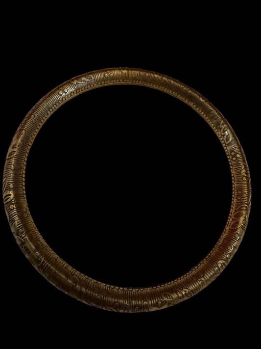 Gold tone design bangle