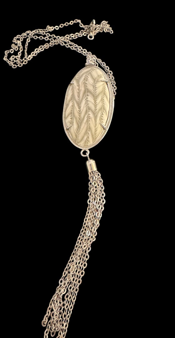 Silvertone Oval design tassel necklace