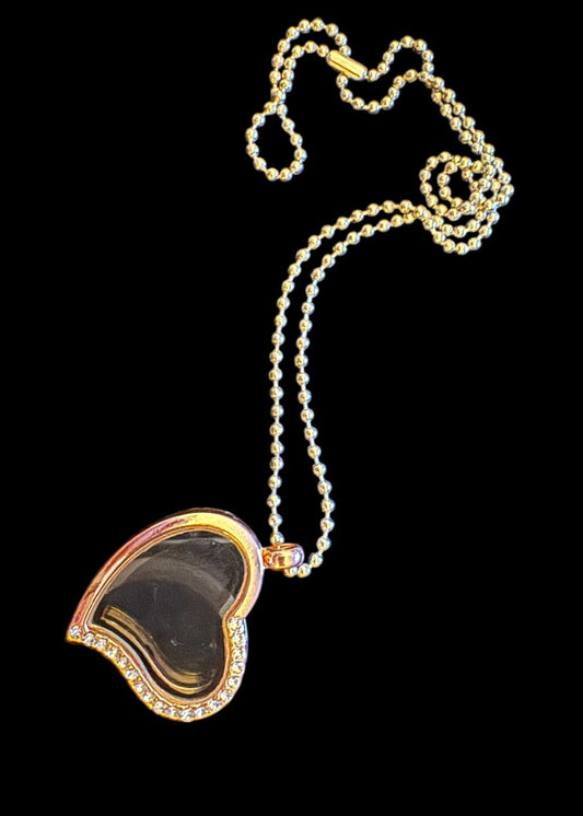 Clear heart locket necklace