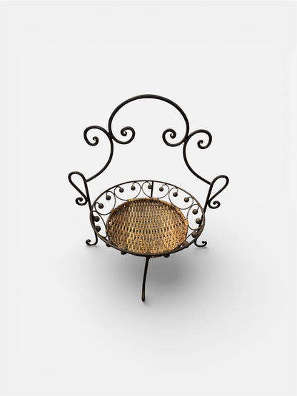 Vintage wicker and wrought iron basket