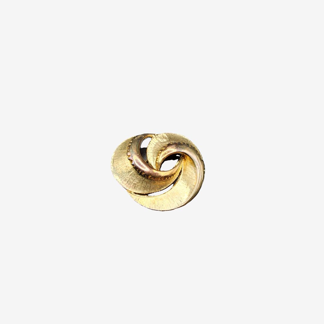 Vintage  gold toned rays swirl brooch