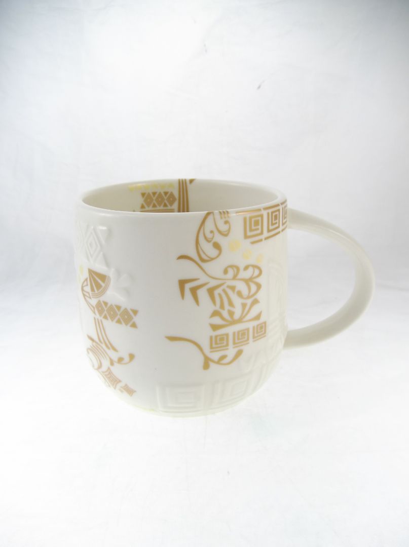 Gold Starbucks 2012 Aztec Mug