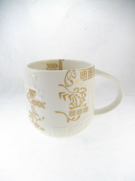 Gold Starbucks 2012 Aztec Mug