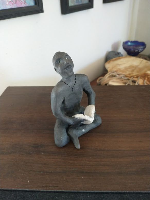 Ceramic Figurine w/book, Raku-fired