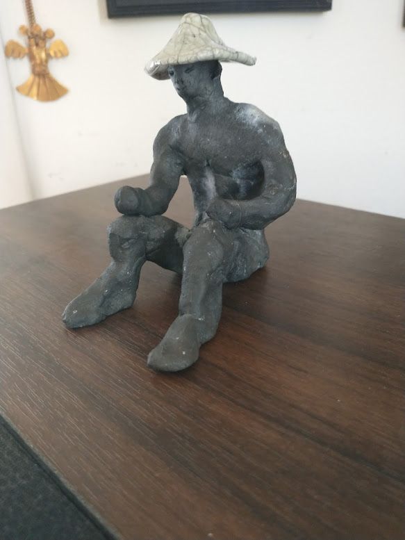 Ceramic Figurine w/hat, Raku-fired