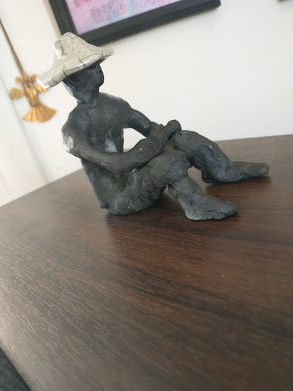 Ceramic Figurine w/hat, Raku-fired