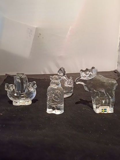 Varies Assorted glass paperweights Sweden