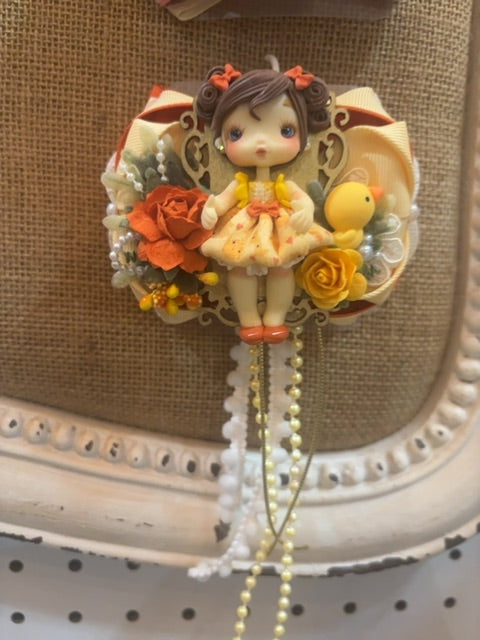 MysticalCreationsByMaira Handcrafted Clay doll bow