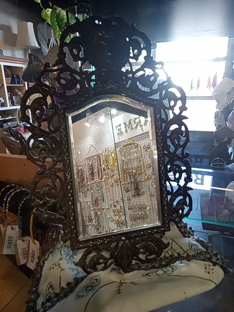 1880's piece of late-19th-century American craftsmanship: an antique Victorian Rococo Revival vanity mirror.