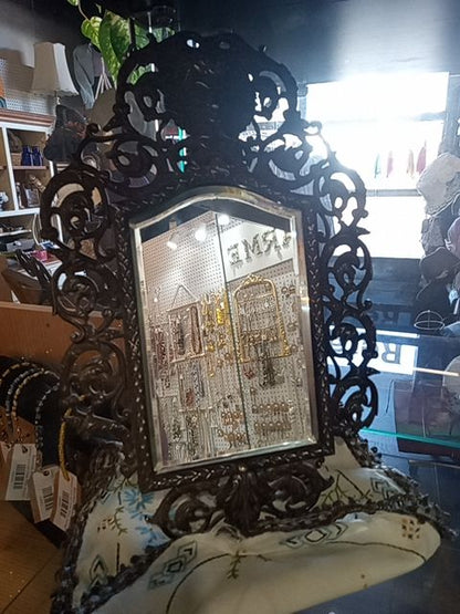 1880's piece of late-19th-century American craftsmanship: an antique Victorian Rococo Revival vanity mirror.