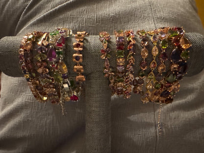 Jewel tones Unknown Multi jewel toned bracelet in gold tone metal, 7 to 8 inches