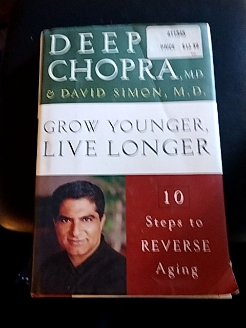 Wht, grn, burgundy  Book by Deep Chopra and David Simon