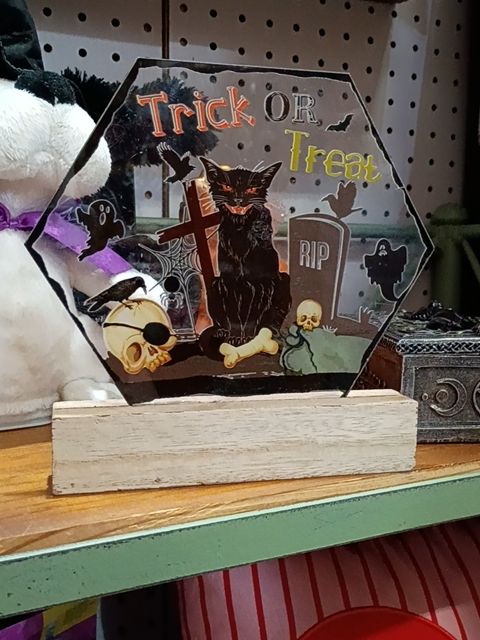 Halloween trick or treat sign with black cat