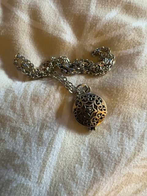 Small silver tone aroma therapy necklace