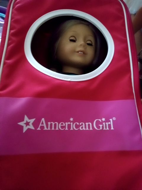 Retired American girl doll with case and clothes