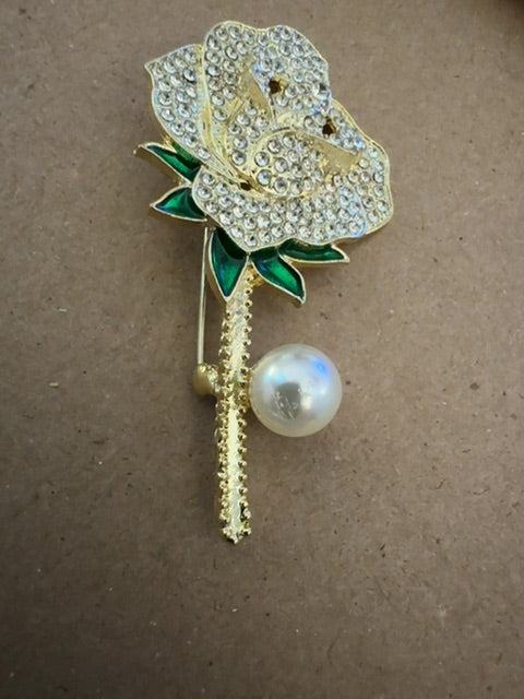 Silvertone shiny rose brooch