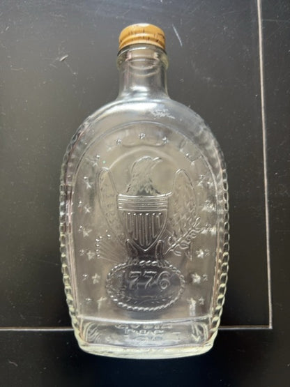 Vintage log cabin, “ bald eagle” bottle