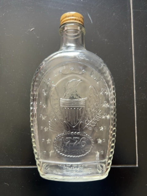 Vintage log cabin, “ bald eagle” bottle