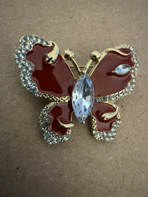 Maroon butterfly brooch