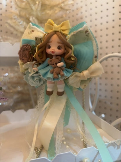 MysticalCreationsByMaira Handcrafted Clay doll bow