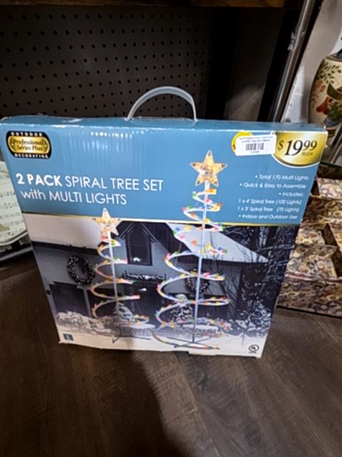 Spiral Christmas trees. ( new in box)
