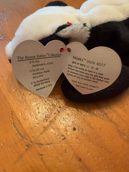 Beanie baby Stinky. With tag.