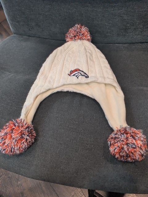 Cream NFL Broncos Cable Knit Ear Flap Beanie w/ Pom-poms