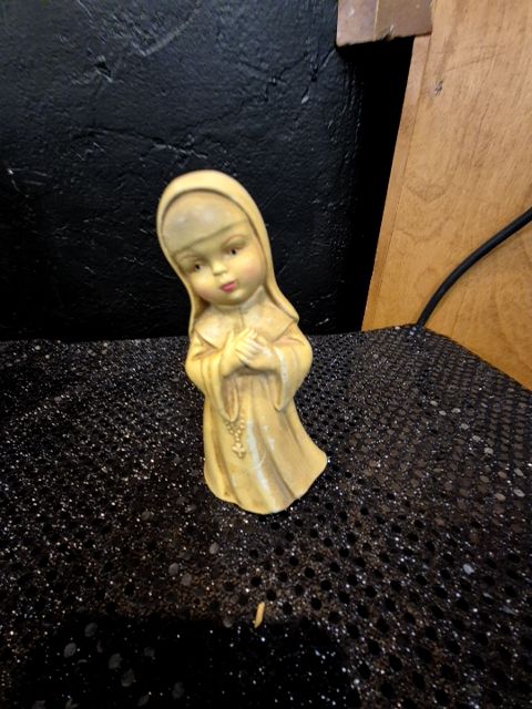 Yellow  Painted Ceramic Nun, 2.5" × 4.75"