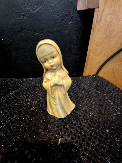 Yellow  Painted Ceramic Nun, 2.5" × 4.75"