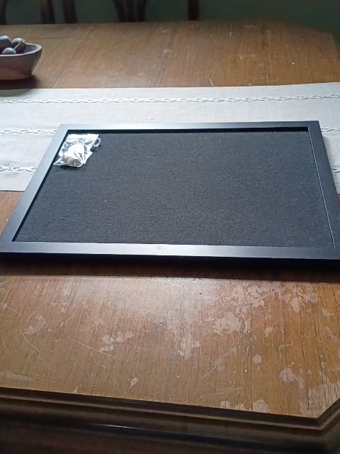 Black framed bulliten board w/ tacks 12" x 17"