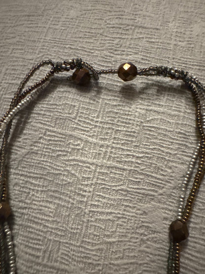 Brown, clear, silver Unknown Quartz and tiger eye bead necklace., 18 inch