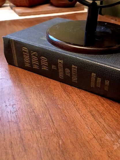 Vintage hard cover book 1964 "who's who", 8" black globe