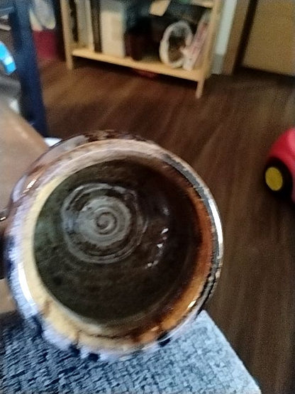 Brown, tand, with subtle hints of blue  Hand thrown pottery coffee mug