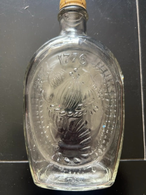 Vintage log cabin “Cornucopia “ bottle