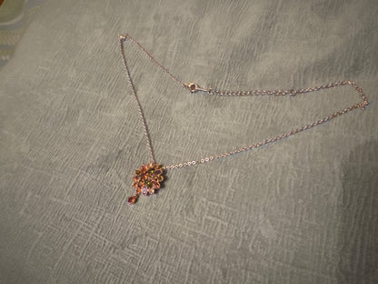 Multi, rose Unknown Rose gold tone setting with multi colored stones