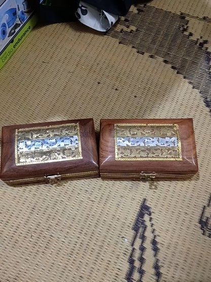 Wooden trinket box with metal design