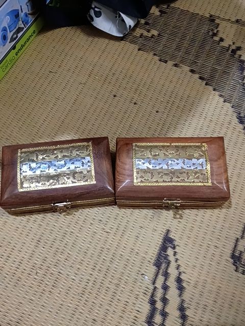 Wooden trinket box with metal design
