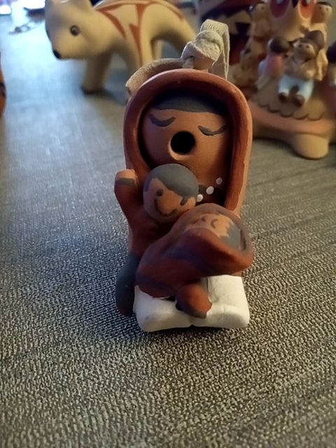 Signed storyteller ornament