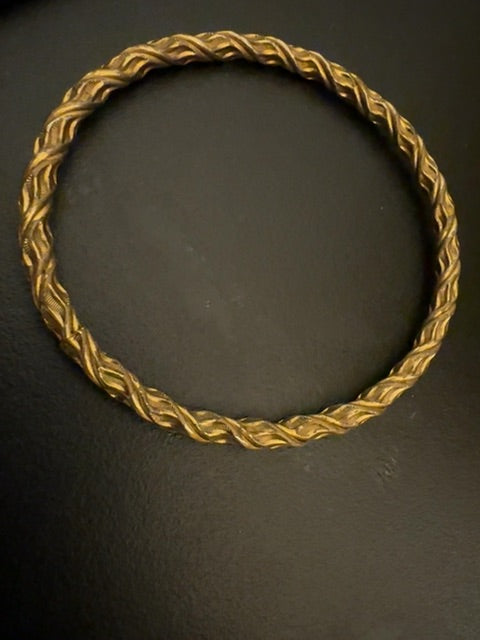 Gold tone bangle