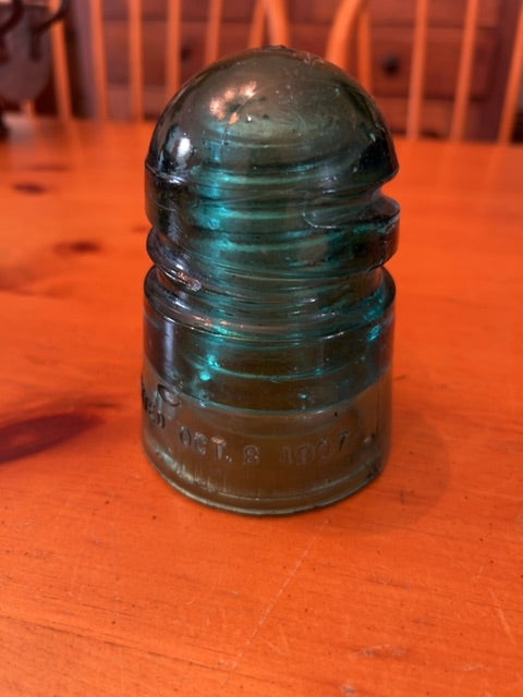 Vintage teal glass insulator