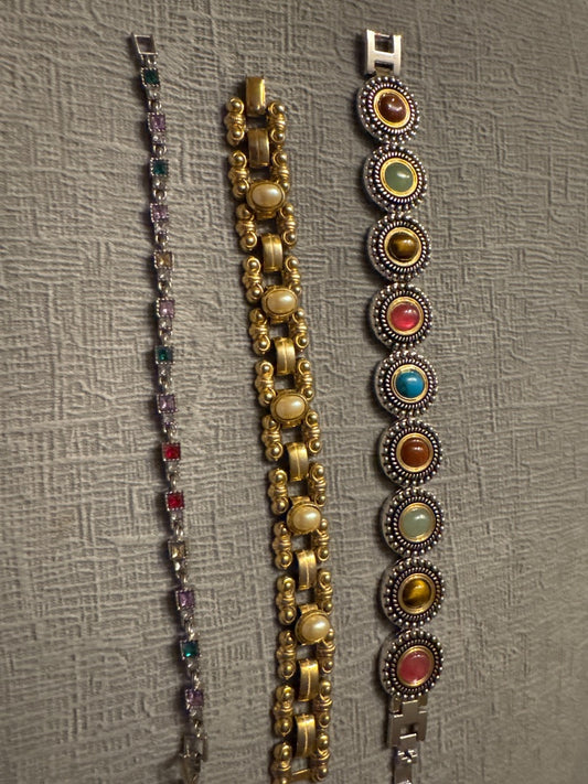 Silver and gold tone Unknown Costume bracelets