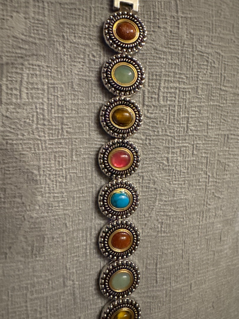 Silver and gold tone Unknown Costume bracelets