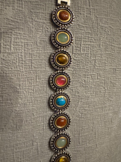 Silver and gold tone Unknown Costume bracelets