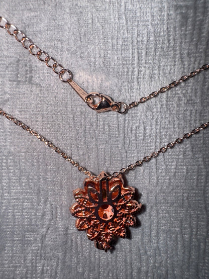 Multi, rose Unknown Rose gold tone setting with multi colored stones