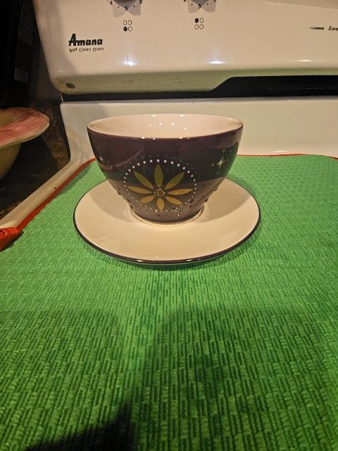 Starbucks Vintage 2006 Holiday cup and saucer