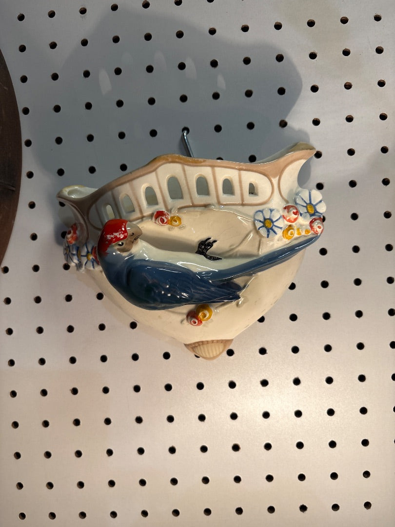 Vintage wall hanging planter with bird