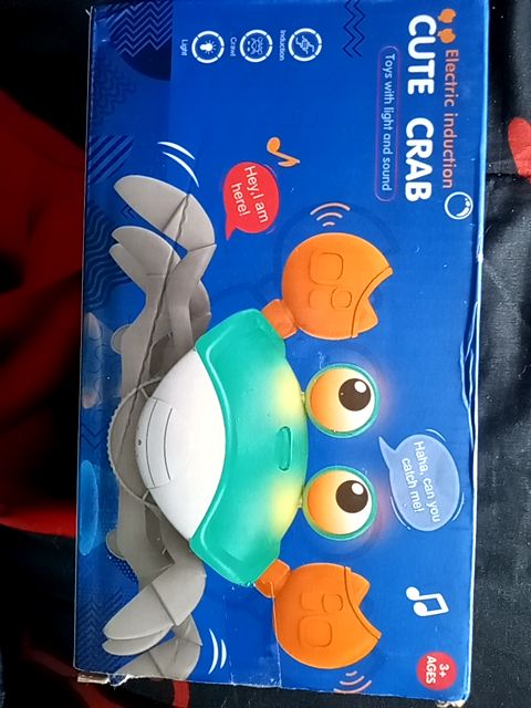 Blue, gray, white, orange  Electric light up crab