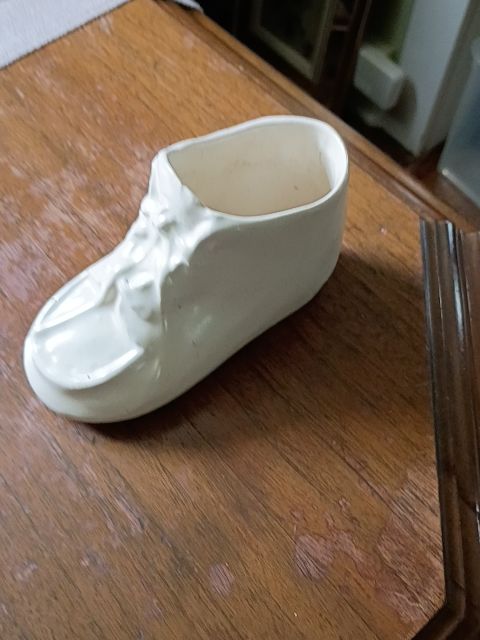 Cream color ceramic babyshoe