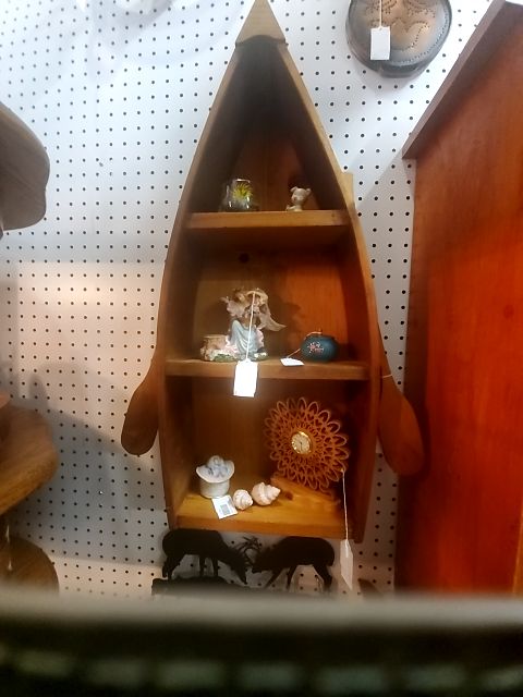 Row boat shelf w/oars